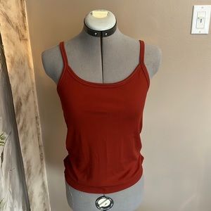 This Rust/red colored tank top is fully cotton and very soft! It is a cute color